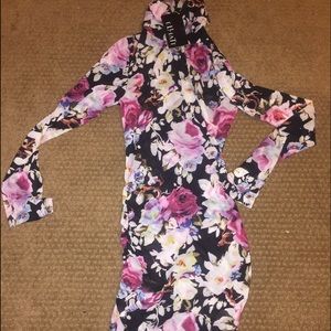 Turtle neck floral dress , fitted but stretchy